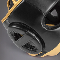 Casque de sparring noir et or en cuir PU avec garniture dorée, protection de tête pour boxe, Muay Thai, Kickboxing, Sanda, MMA, protection de tête pour adulte