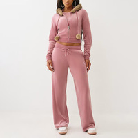Fabricant OEM Logo personnalisé Ensemble de survêtement en velours pour femmes Ensemble deux pièces avec bordure en fausse fourrure et sweat à capuche zippé et pantalon de survêtement avec strass