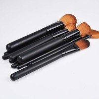 Ensemble de 12 pinceaux de maquillage vegan en poils synthétiques avec manche en bois noir confortable Dongshen pour le correcteur et les lèvres