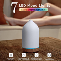 Diffuseur d'huiles essentielles en céramique 200 ml, base imitation bois, humidificateur ultrasonique d'aromathérapie avec 7 lumières colorées et minuterie pour la maison