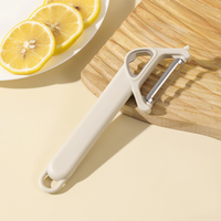 Éplucheur multifonction ergonomique tendance à double usage, couteau à fruits avec ouvre-bouteille, grattoir à peau de légumes pour la cuisine à domicile