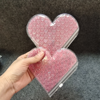 Sac d'expédition à bulles en PVC réutilisable rose avec fermeture éclair thermoscellable et impression blanche en forme de cœur