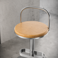Tabouret de bar en acier argenté minimaliste de 65 cm à hauteur fixe avec siège rembourré noir pour café et restaurant