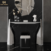 Mobilier de salon de table console de salon design de luxe durable en acier inoxydable à structure métallique noire et dorée
