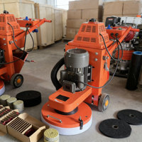 Machine professionnelle de ponçage de sols en béton et terrazzo avec moteur électrique pour la finition des surfaces en pierre