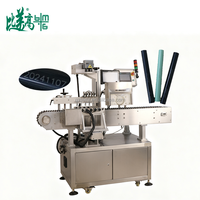 Machine d'impression laser UV entièrement automatique à rotation et positionnement pour crayons à sourcils, tubes ronds et produits cylindriques