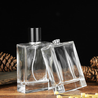 Flacon de parfum en verre carré de 105 ml avec pompe pulvérisatrice dorée et argentée, emballage personnalisé avec logo