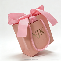 Sacs cadeaux de luxe en papier avec logo personnalisé, ruban en soie, poignée en nœud, sacs en carton blanc pour mariage avec nœuds décoratifs