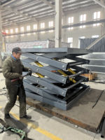 Plateforme élévatrice à ciseaux stationnaire électrique hydraulique de type EU de 4,5 tonnes avec garde-corps