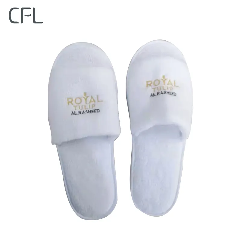 CFL — pantoufles en tissu non tissé blanc, jetables, avec logo personnalisé, chaussures de luxe, collection d'hôtel, vente en gros