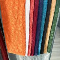 ANONO Lots excédentaires de haute qualité Polyester Spandex bulle gaufré tissu tricoté vêtements de sport tissus textiles élastiques pour manteau