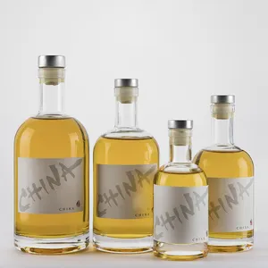 Fornitore della cina vuoto 500ml 750ml trasparente rotondo liquore bottiglia di vetro bandy vodka vodka whisky liquore bottiglia di bevande personalizzato