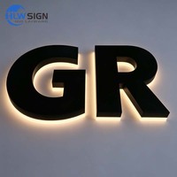 Logo rétroéclairé en acier inoxydable, finition peinture noire, lettres rétroéclairées par LED, enseigne commerciale en métal rétroéclairée