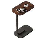 Table basse moderne et minimaliste pour salon, avec structure en acier inoxydable et plateau en bois massif, petite taille, grande valeur esthétique