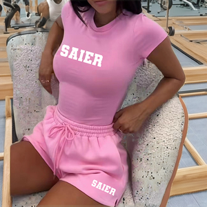 ชุดกีฬาของผู้หญิงชุดเสื้อยืดสั้นผ้าฝ้าย2ชิ้นกางเกงขาสั้นสำหรับนักปั่นออกกำลังกายในฤดูร้อนแบบลำลองพร้อมที่คาดผมสไตล์ย้อมเรียบ - Product Image 2