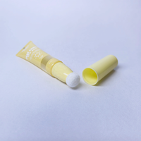 Tube cosmétique PE couleur personnalisée avec interrupteur rotatif, applicateur de fard à joues floqué, capacité 10-25 ml pour soins de la peau, fard à paupières, crème pour les yeux