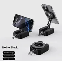 Support de voiture pliable Portable double face magnétique avion de bureau haute vitesse Rail voyage d'affaires support de téléphone en alliage transfrontalier