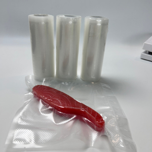 Sacs en plastique à trois soudures latérales, rouleaux de sacs gaufrés sous vide pour l'emballage et le stockage des fruits de mer, emballage transparent pour aliments et <span class=keywords><strong>pain</strong></span> en PA/PE - Product Image 1