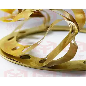 Brass layer tear gasket for adjusting valve blade clearance