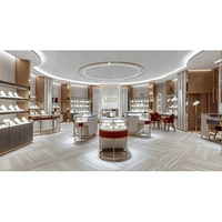 Vitrine de présentation haut de gamme en bois rouge et or pour bijouterie, conception complète de magasin sur mesure ODM/OEM, solution de vitrine tout-en-un