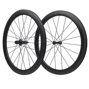 Juego de <span class=keywords><strong>ruedas</strong></span> de fibra de <span class=keywords><strong>carbono</strong></span> 700c 100mm/130mm 20-24 agujeros Freno de llanta 10-11 velocidades Clincher Tubeless 38mm Juego de <span class=keywords><strong>ruedas</strong></span> de <span class=keywords><strong>carbono</strong></span> para bicicleta - Product Image 1