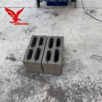 Prix de la machine à fabriquer des blocs de béton pour la ponte des œufs, machine à fabriquer des briques manuelles à emboîtement