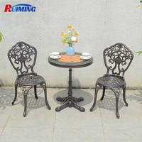 Ensemble de trois pièces pour salle à manger d'extérieur moderne Table de balcon en fonte d'aluminium et chaises en fer forgé pour les hôtels et les bistrots Mobilier de café
