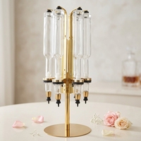 Présentoir à parfum rotatif doré à 6 têtes, machine de remplissage de parfum à 6 pompes dorées
