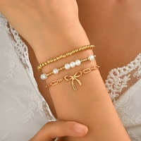 Ensemble de 3 bracelets élégants en perles imitées avec nœud papillon pour femmes, breloques, chaîne de main empilée en perles CCB, accessoires de bijoux tendance