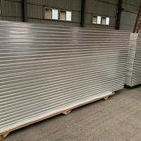 Panneau sandwich en laine de roche pour bâtiments industriels avec système de protection ignifuge pour murs et toitures