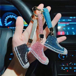Lujo completo Rhinestone mini zapato de lona llavero Bling pareja diamante 3D zapatilla brillo cristal llavero para niñas coche llavero - Product Image 1