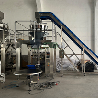 Machine d'emballage automatique de bonbons au chocolat et de noix, système de scellage à l'azote, machine d'emballage VFFS pour la conservation de la fraîcheur