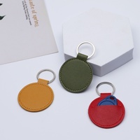 Porte-clés rond en cuir PU, porte-clés en cuir, badge, médaille, pièce commémorative, housse de protection, pendentif, logo personnalisable