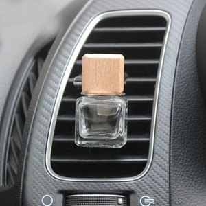 Botella de salida de aire de buena calidad, aire acondicionado de automóvil para botella difusora de ventilación de coche, <span class=keywords><strong>clip</strong></span> de hierro de salida de aire de coche blanco y negro - Product Image 4