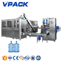 Machine de remplissage automatique complète de baril d'eau de 19L 20L 5 gallons Ligne de production d'eau de 5 gallons
