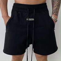 Shorts d'entraînement pour hommes, coupe ample, taille mi-haute, taille élastique avec poche latérale zippée, décontracté pour le style urbain et les tenues de sport