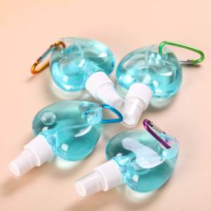 Mini flacon pulvérisateur portable en plastique transparent bleu de 30 ml en forme de cœur pour désinfectant pour les mains avec porte-clés - Product Image 1