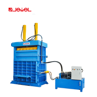 Presse à balles hydraulique verticale semi-automatique à haute efficacité pour le recyclage des déchets de balles de pneus automobiles de véhicules en caoutchouc usagés