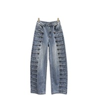 Le nouveau style d'automne américain : jeans à boutons côtelés en métal vieilli, coupe ample et courbée, pantalons à jambes larges et pantalons longs.