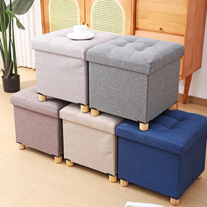 Pouf de <span class=keywords><strong>rangement</strong></span> en tissu gris pliable, repose-pieds et siège carré avec pieds en bois et couvercle pour vêtements - Product Image 1