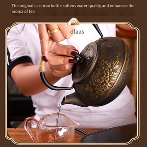 <span class=keywords><strong>ต้ม</strong></span>น้ำชาในเตาทรงกลมพร้อมหม้อเหล็กหล่อลายดอกโบตั๋นแบบจีน ชุดน้ำชาเหล็กหล่อทำมือแบบไม่เคลือบ ของขวัญสุดพิเศษ - Product Image 3