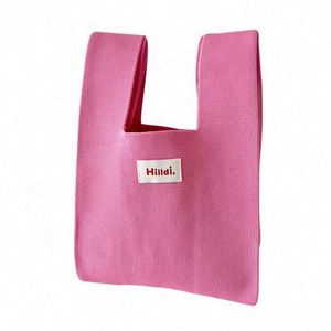 Bolso de mano de punto Macron colorido con logo impreso personalizado al por mayor, bolso tote de punto de color sólido para muñeca - Product Image 4