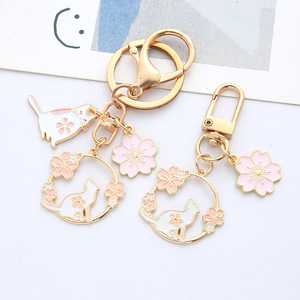 En stock, nouveau porte-clés mignon en forme de lapin porte-bonheur, fleur de cerisier, porte-clés en métal 3D émaillé kawaii pour femmes, sac à dos - Product Image 1
