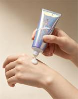 Tube cosmétique en PE holographique irisé avec bouchon à clapet, impression personnalisée, emballage vide pour lotion corporelle et crème pour la peau