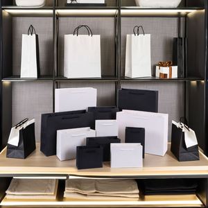 Paper <b>Bag</b> Print Cheap Supplier Custom Logo Luxury China Luxury Packaging <b>Clothing</b> Packaging Heat Seal Gravure Printing Art Paper - Product Image 2