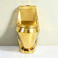 WC monobloc en céramique dorée au design moderne, à double chasse, avec siphon en P
