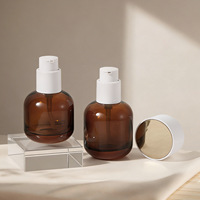 Luxuriöses Bernsteinfarbenes Lichtundurchlässiges Glas-Hautpflegeset 30ml 50ml 100ml 120ml Lotion-Serum-Pumpflasche Kosmetikverpackung 30g 50g Cremedose