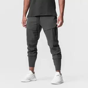 Üretim özel hızlı kuru kargo pantolon Sweatpants koşu erkekler eğitim spor eşofmanı cepler ile