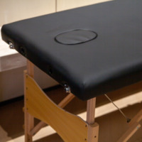Table pliable moderne portable à 2 sections pour le traitement de salon Spa beauté en gros lit de massage professionnel de haute qualité