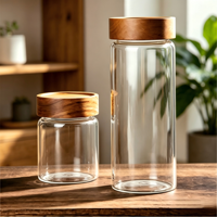 Le récipient en verre silicate à haute teneur en bore, livré avec un couvercle en bois d'acacia, convient au stockage du café, du thé et des céréales.